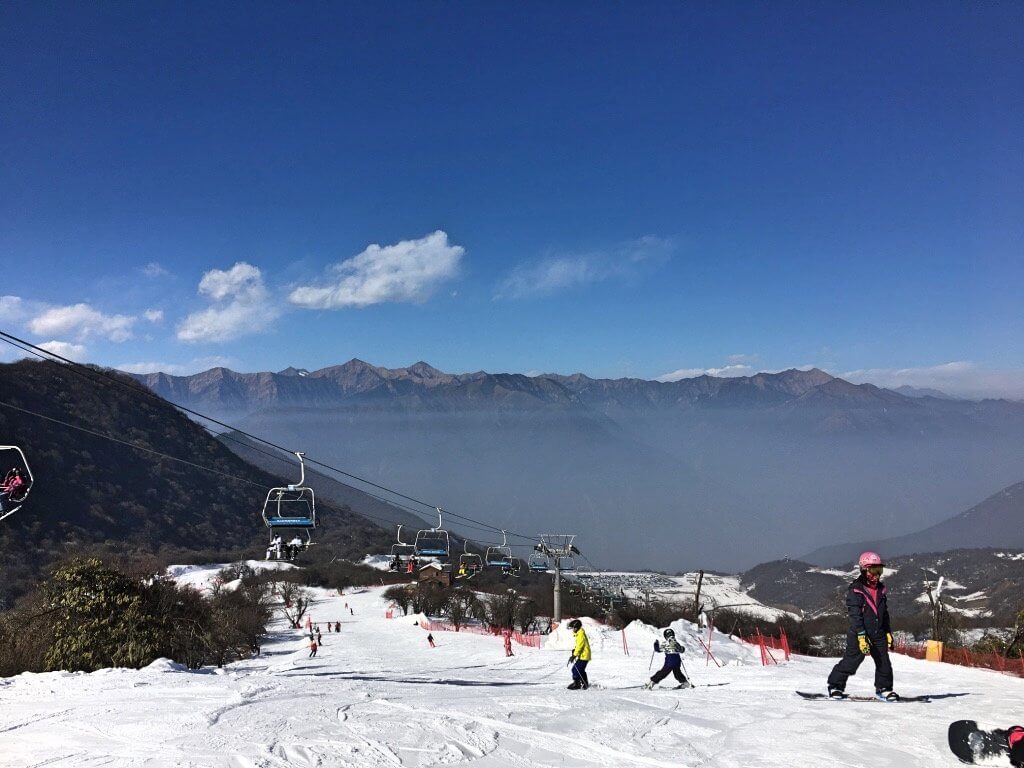 Ski slope with mountains in the background