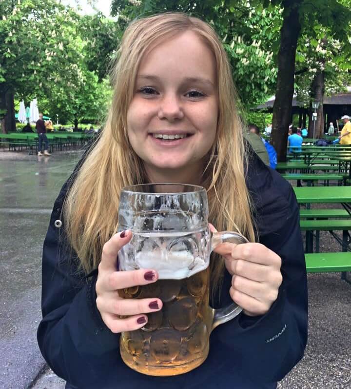 woman drinking beer in beer garden