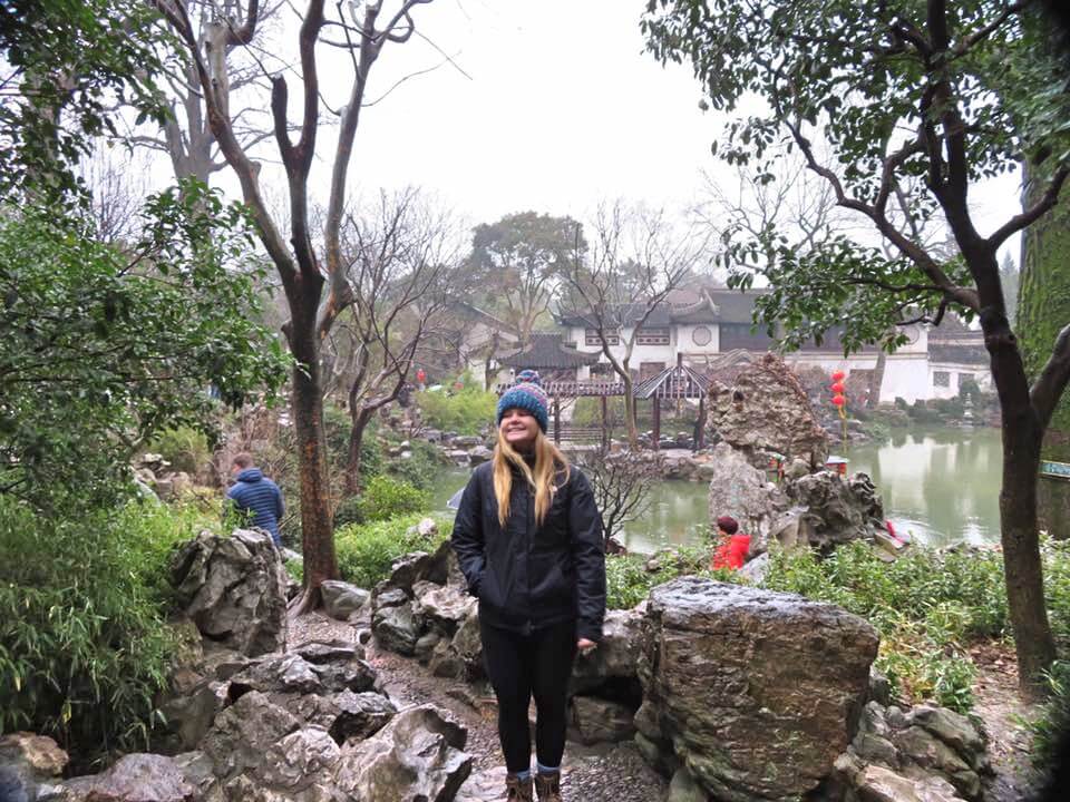 Girl in Chinese garden in Suzhou