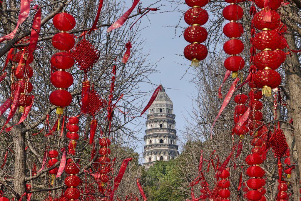 View of pagoda surrounded by Chinese lanterns